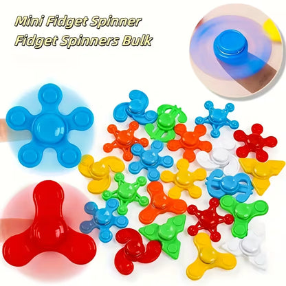 candytoys.ch Bunte Mini-Gyros im Kombi-Pack - 4 Stück Finger-Spielzeug